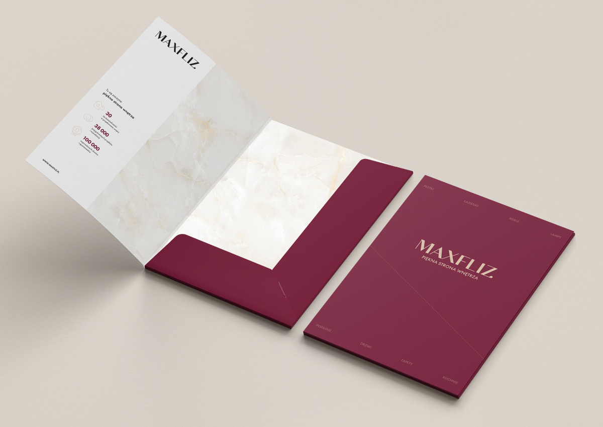 Projekt teczki ofertowej premium dla salonów wyposażenia wnętrz Maxfliz. Projektant Hubert Wawrzkowicz.